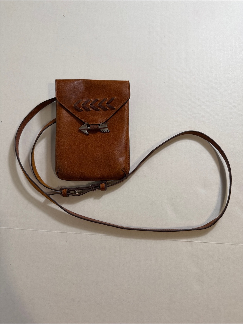 Most Wanted USA Western-style brown genuine handmade leather crossbody bag.